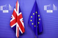 FILE PHOTO: British and European Union flags are seen ahead of a meeting of European Commission President Ursula von der Leyen and British Prime Minister Boris Johnson in Brussels