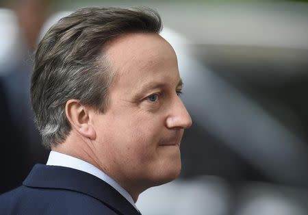 Britain's outgoing Prime Minister, David Cameron, pauses during his speech in front of number 10 Downing Street, on his last day in office as Prime Minister, in central London, Britain July 13, 2016. REUTERS/Toby Melville