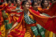 Tribal Bodo girls in traditional attire perform Sikhlai dance on Independence Day in Gauhati, northeastern Assam state, India, Monday, Aug. 15, 2022. The country is marking the 75th anniversary of its independence from British rule. (AP Photo/Anupam Nath)