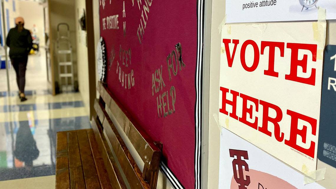 A voters goes into Tates Creek Elementary School to cast their ballot on election day, Tuesday, Nov. 8, 2022 in Lexington, Ky. Polls are open across the state from 6 a.m. to 6 p.m. local time. You must be in line by 6 p.m. to be allowed to cast a ballot.