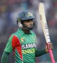 Bangladesh's captain Mushfiqur Rahim comes off the field after being dismissed against India during their Asia Cup 2014 one-day international (ODI) cricket match in Fatullah February 26, 2014.