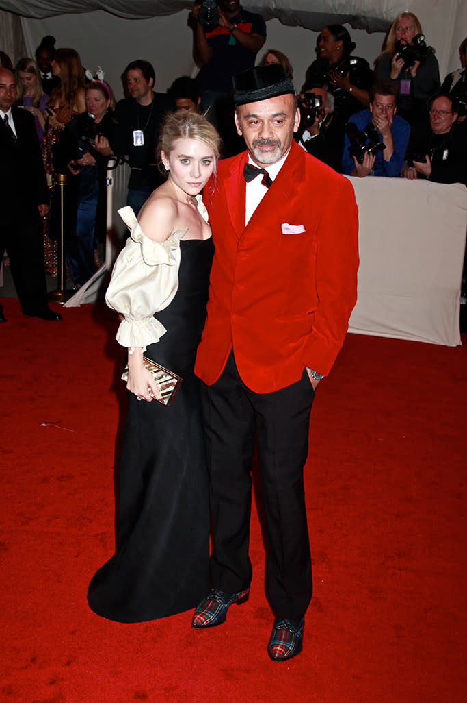 Ashley Olsen and Christian Louboutin in 2011. - Credit: REX Shutterstock.