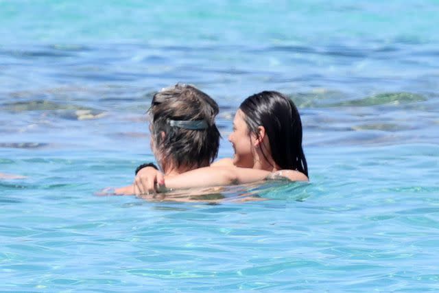 <p>Ciao Pix / Shutterstock / SplashNews.com</p> Pine and his unidentified date wrapped their arms around each other while taking a dip in the Mediterranean.