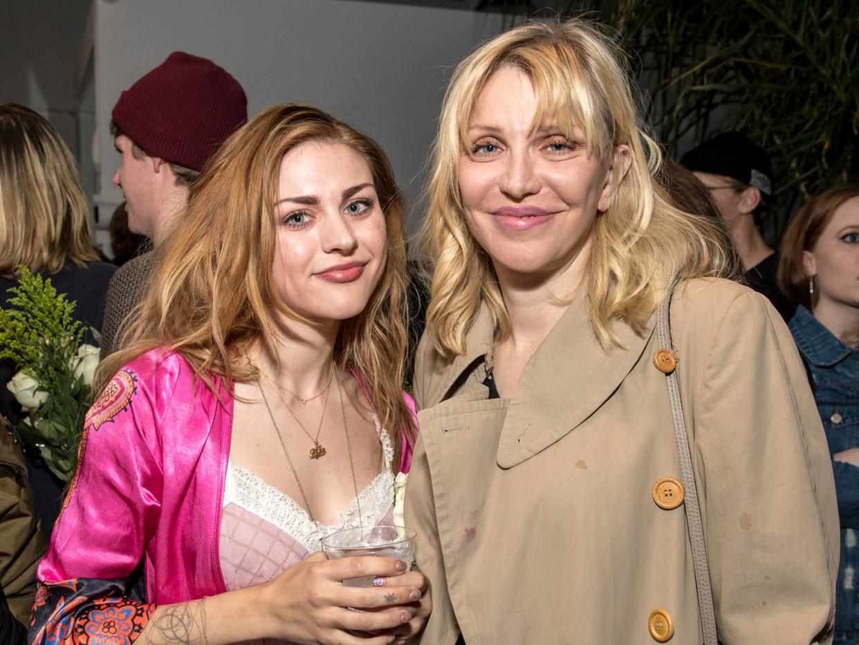 Frances Bean Cobain (L) and Courtney Love attend 'Other Peoples Children launch and store opening' at Other Peoples Children on March 8, 2018 in Los Angeles, California