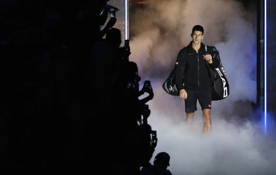 Novak Djokovic of Serbia arrives for his tennis match against Stan Wawrinka of Switzerland at the ATP World Tour finals at the O2 Arena in London, in this November 12, 2014 file photo. REUTERS/Suzanne Plunkett/Files (BRITAIN - Tags: SPORT TENNIS TPX IMAGES OF THE DAY)