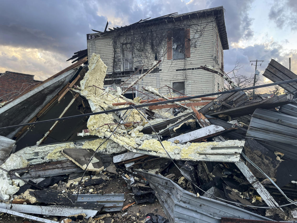 A damaged structure and debris are seen in the aftermath of severe weather, Thursday, Jan. 12, 2023, in Selma, Ala. A large tornado damaged homes and uprooted trees in Alabama on Thursday as a powerful storm system pushed through the South. (AP Photo/Butch Dill)