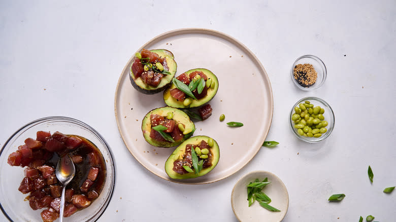 tuna poke stuffed avocados on plate