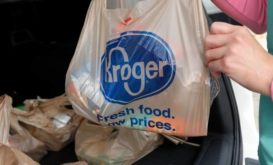 A customer removes her purchases at a Kroger grocery store in Flowood, Mississippi, in this file photo from June 26, 2019.