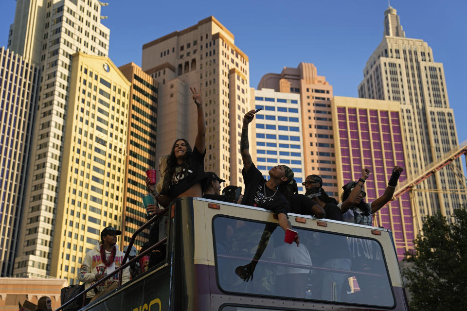 Las Vegas Aces players during a parade to celebrate the team's WNBA championship Monday, Oct. 23, 2023, in Las Vegas. (AP Photo/John Locher)
