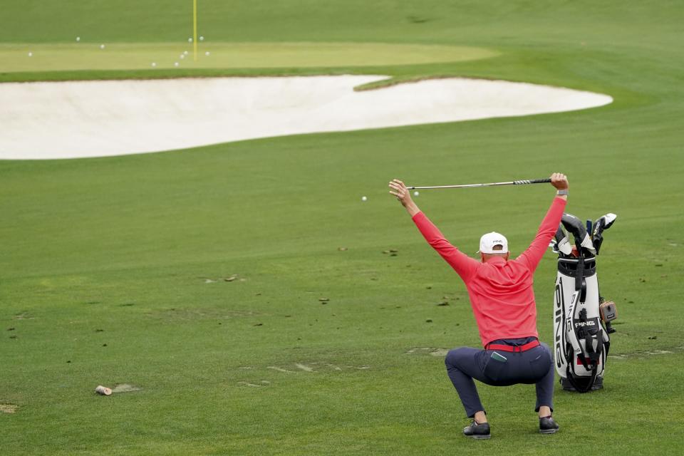 Apr 3, 2023; Augusta, Georgia, USA; Adrian Meronk stretches at the practice facility during a practice round for The Masters golf tournament at Augusta National Golf Club. Mandatory Credit: Katie Goodale-USA TODAY Network