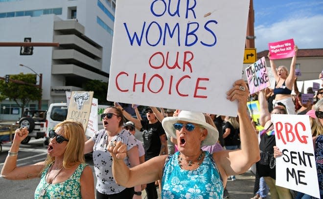 An abortion rights crowd rallies at the Sarasota County Courthouse steps May 2, a day after the leaked U.S. Supreme Court draft opinion document surfaced.