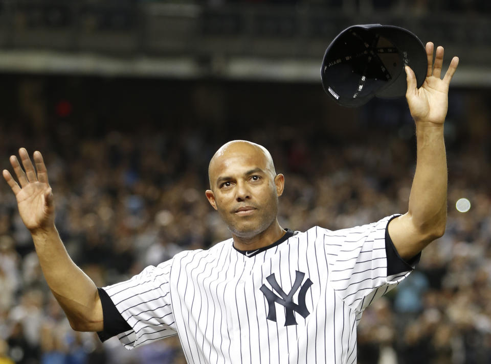 FILE - In this Sept. 26, 2013, file photo, New York Yankees relief pitcher Mariano Rivera acknowledes the crowd's standing ovation after coming off the mound in the ninth inning of his final appearance in a baseball game in New York. Rivera will be inducted into the Baseball Hall of Fame on Sunday, July 21, 2019, in Cooperstown, N.Y. (AP Photo/Kathy Willens, File)