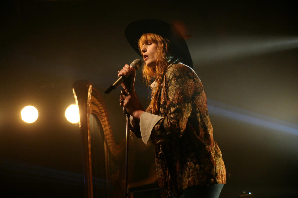 Florence Welch in a floral patterned top and giant cowgirl hat in June, 2015. 