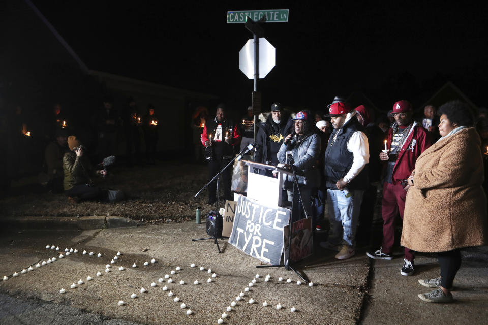 FILE - RowVaughn Wells, the mother of Tyre Nichols, flanked by family members of Nichols, speaks during a candlelight vigil on the anniversary of her son's death Sunday, Jan. 7, 2024, in Memphis, Tenn. The city of Memphis on Wednesday, Feb. 14, 2024, released additional documents tied to the January 2023 fatal beating of Nichols by five police officers, a brutal attack captured on video that sparked outrage and intensified calls for police reform. (AP Photo/Karen Pulfer Focht, File)