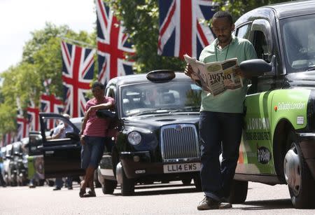 Taxis block the Mall in central London June 11, 2014. REUTERS/Luke MacGregor