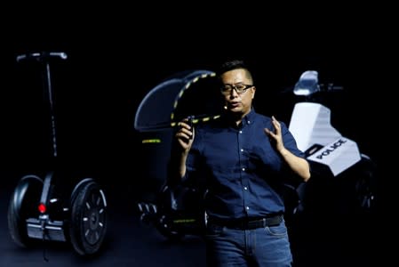 Ninebot CEO Gao Lufeng speaks at a Segway-Ninebot product launch event in Beijing