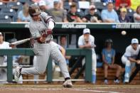 Jun 19, 2018; Omaha, NE, USA; Mississippi State Bulldogs designated hitter Jordan Westburg (11) hits a grand slam home run in the second inning against the North Carolina Tar Heels in the College World Series at TD Ameritrade Park. Mandatory Credit: Steven Branscombe-USA TODAY Sports