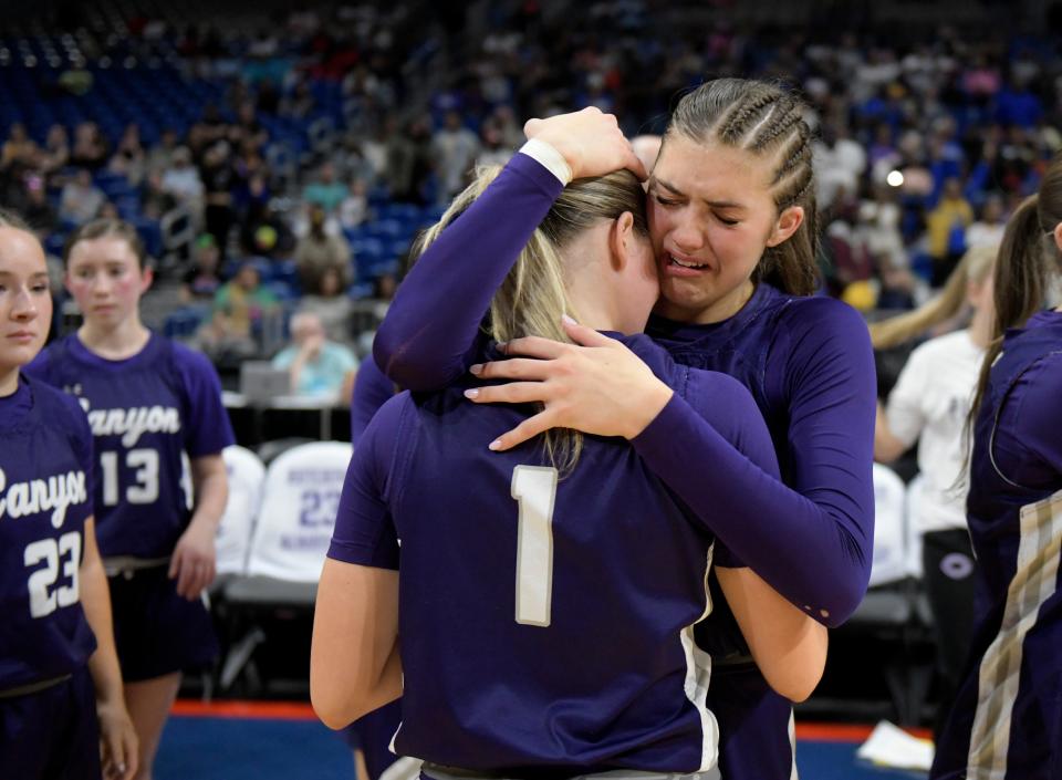 Canyon's Sydnee Winfrey, right, embraces Canyon's Tai Wright after the team's loss against Waco La Vega in the girls basketball Class 4A state championship, Saturday, March 2, 2024, at the Alamodome in San Antonio.