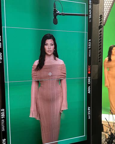 <p>Instagram/kourtneykardash</p> Kourtney Kardashian shares a shot of herself filming 'The Kardashians' promo in front of a green screen.