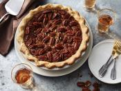 <p>This is not your average pecan pie. Classic, ooey gooey, rich praline pecan pie filling meets just enough bourbon —think fragranced, without being boozy—in our Bourbon Pecan Pie. This pie may look and taste impressive, but it's deceptively easy. It tastes great warm, cold, or at room temperature and pairs excellently with ice cream or whipped cream. Store leftovers covered in the fridge for up to 3 days, or mix with vanilla ice cream and some extra bourbon for a killer <a href="https://www.myrecipes.com/summer-grilling/summer-drinks/fruit-smoothies-and-shakes" rel="nofollow noopener" target="_blank" data-ylk="slk:milkshake" class="link ">milkshake</a>. <a href="https://www.myrecipes.com/recipe/bourbon-pecan-pie" rel="nofollow noopener" target="_blank" data-ylk="slk:View Recipe" class="link ">View Recipe</a></p>