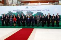 Vietnam's Prime Minister Nguyen Xuan Phuc (C, front) poses for a photo with APEC trade ministers during the APEC Ministers Responsible For Trade (APEC MRT 23) meeting in Hanoi, Vietnam May 20, 2017. REUTERS/Kham