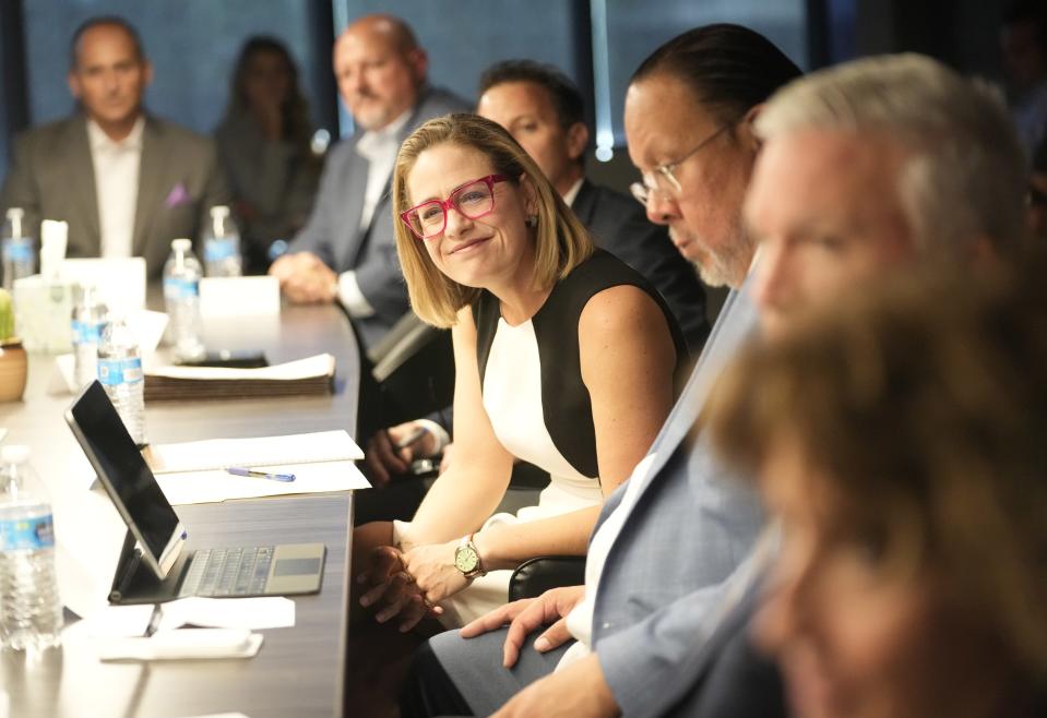 Sen. Kyrsten Sinema leads a council of water experts meeting in her office in Phoenix on Oct. 17, 2022. They were discussing how to spend federal drought relief funds available for keeping Colorado River water in Lake Mead.