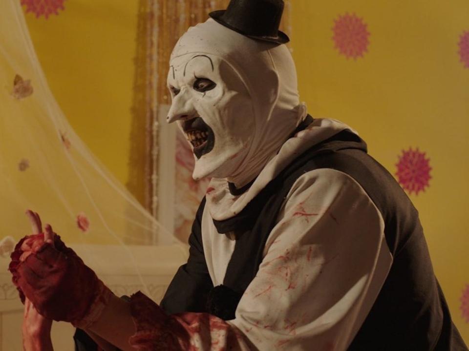 David Howard Thornton as Art the Clown in a bedroom.