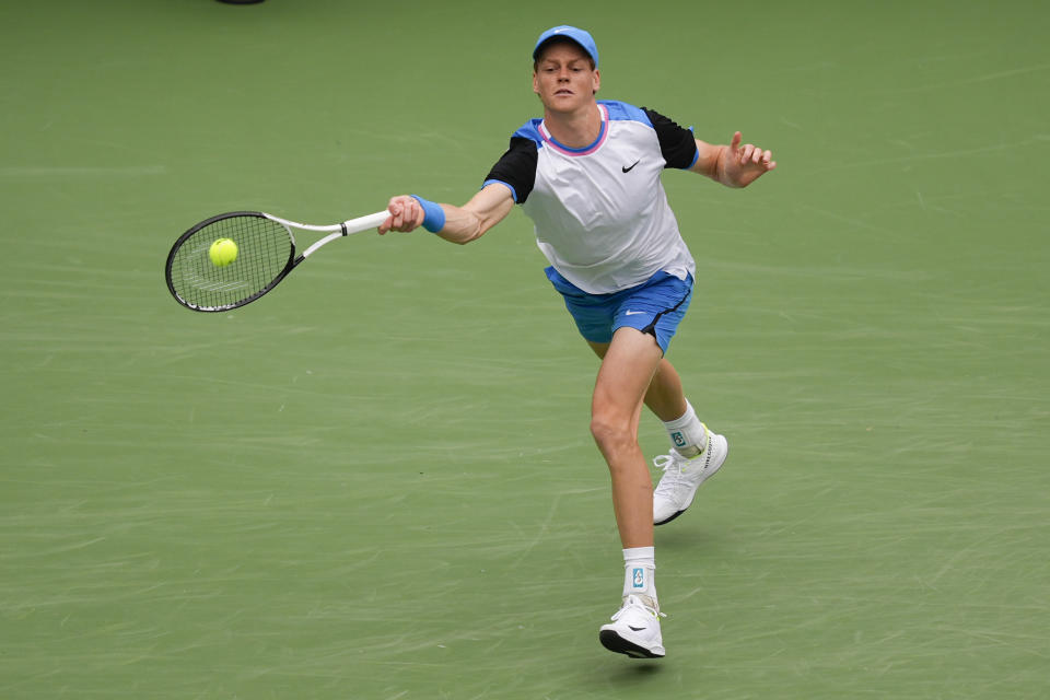 Jannik Sinner, of Italy, returns to Carlos Alcaraz, of Spain, during a semifinal match at the BNP Paribas Open tennis tournament, Saturday, March 16, 2024, in Indian Wells, Calif. (AP Photo/Ryan Sun)