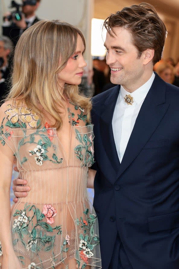 A closeup on Suki Waterhouse and Robert Pattinson