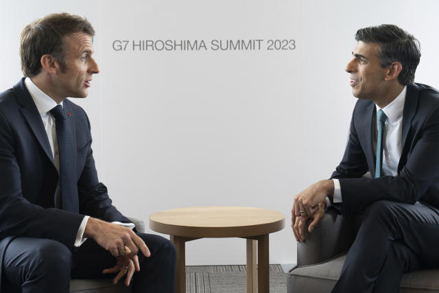 Britain's Prime Minister Rishi Sunak, right, meets with French President Emmanuel Macron during G7 Summit at the Grand Prince Hotel in Hiroshima, western Japan Saturday, May 20, 2023. (Stefan Rousseau/Pool Photo via AP)