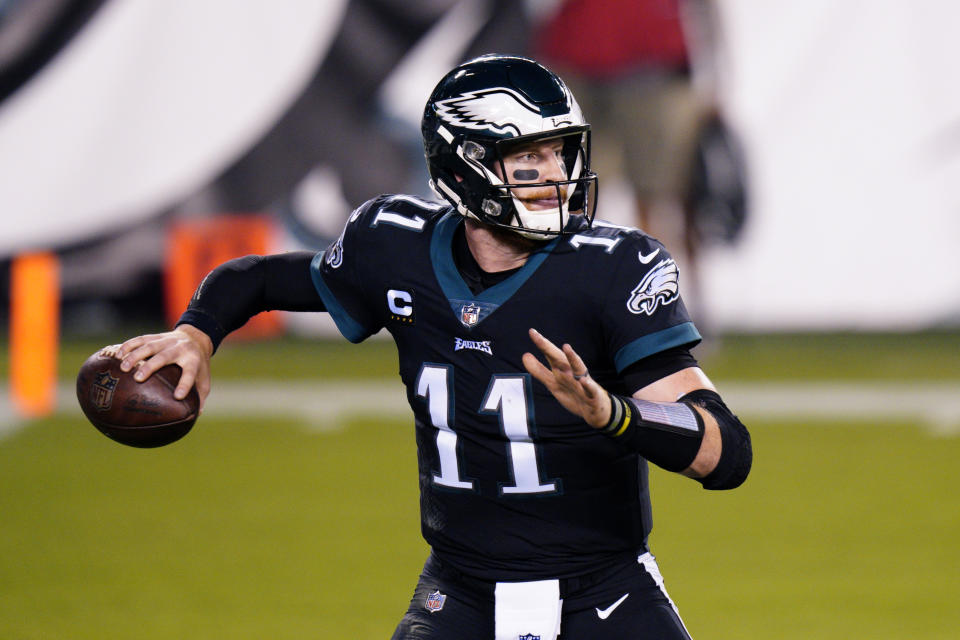 Philadelphia Eagles' Carson Wentz passes during the first half of an NFL football game against the New York Giants, Thursday, Oct. 22, 2020, in Philadelphia. (AP Photo/Chris Szagola)