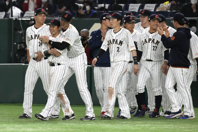 Japanese Shohei Ohtani throws a ball in the first inning during the World  Baseball Classic (WBC) Pool B match between Japan and China at Tokyo Dome  in Tokyo on March 9, 2023. (