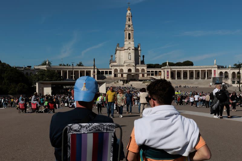 Pilgrims attend the event marking the anniversary of the reported appearance of the Virgin Mary to three shepherd children, at the Catholic shrine of Fatima