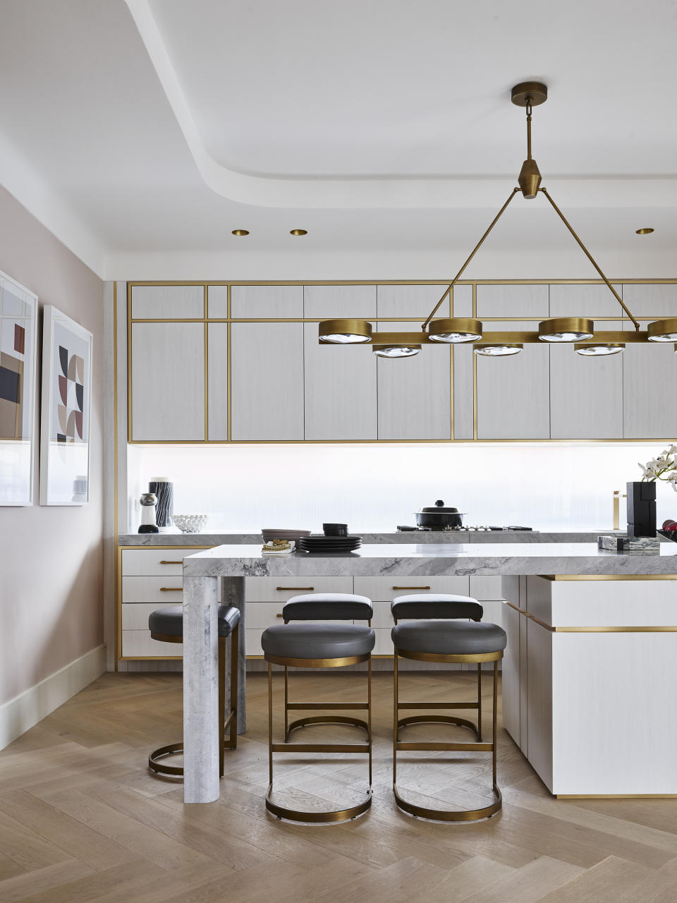 blonde wood kitchen with brass