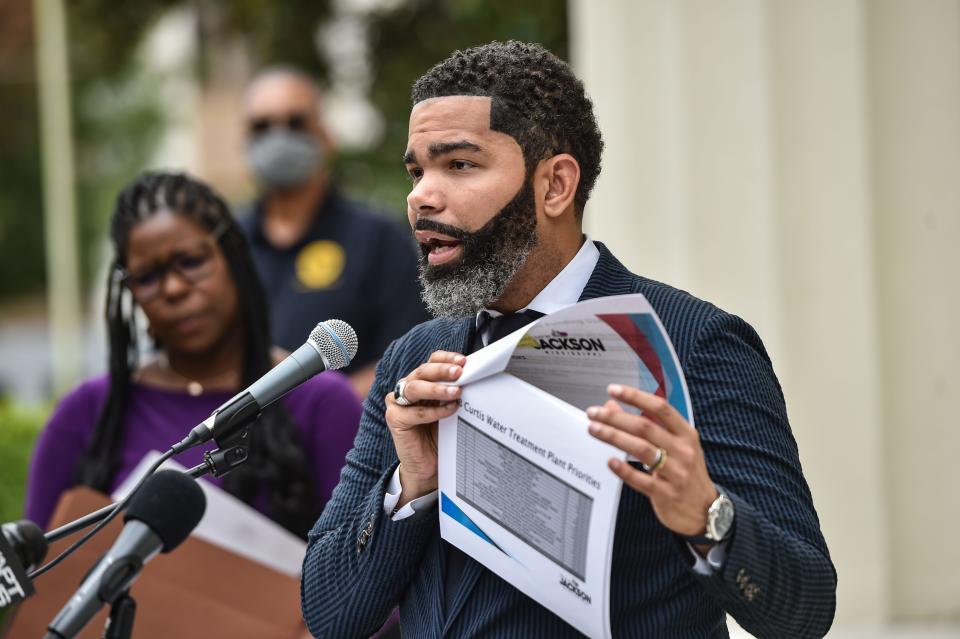 Mayor Chokwe Antar Lumumba speaks at City Hall regarding updates on the ongoing water infrastructure issues in Jackson, Miss., Tuesday, September 6, 2022. Lumumba presents a document which is a copy of a presentation that the city gave to Hinds County legislative delegation detailing repair priorities for the O.B. Curtis Water Treatment Plant.