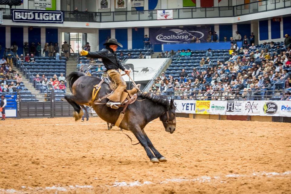 Kieren Gaines of Slash W Cattle scores 76.50 in the ranch bronc riding.