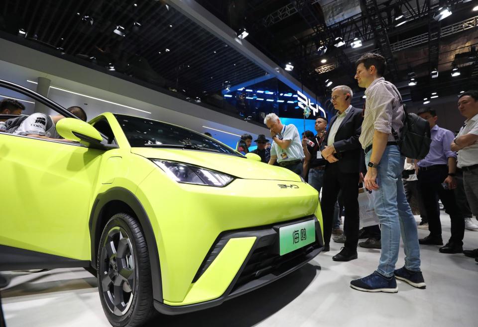 The yellow BYD Seagull electric car at the Shangai auto show.