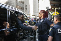 Actor Jonathan Majors shakes hands with court police officers after leaving Criminal Court after his sentencing on Monday April 8, 2024 in New York. (AP Photo/Brittainy Newman)