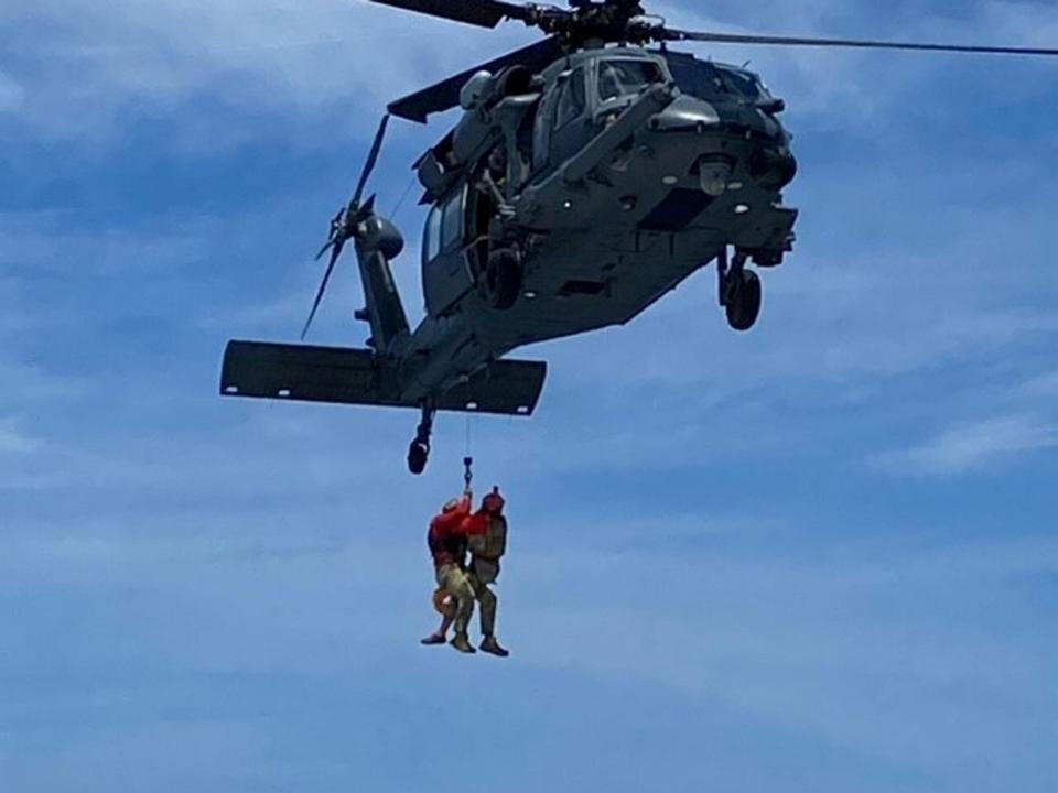 Mother and child lifted into chopper