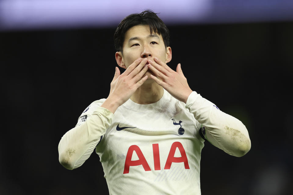 Tottenham's Son Heung-min celebrates at full time of the English Premier League soccer match between Tottenham Hotspur and AFC Bournemouth at the Tottenham Hotspur Stadium in London, Sunday, Dec. 31, 2023. Tottenham won 3-1. (AP Photo/Ian Walton)