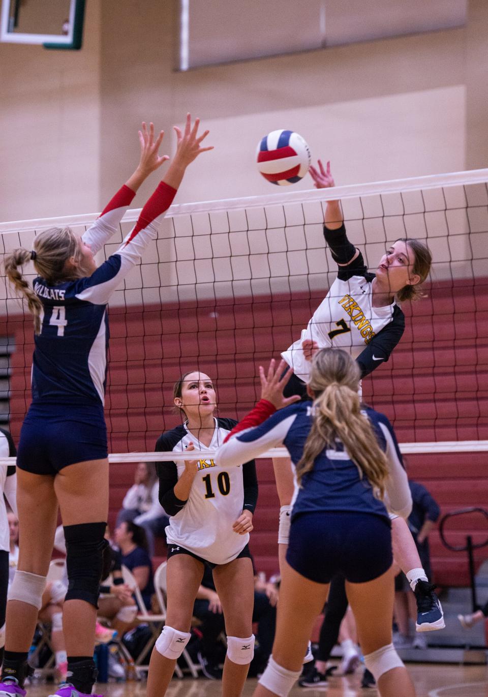 Bishop Verot's Jules Schwartz (7) goes for a kill against Estero in the championship game of the Silver Division in the Wildcat Invite on Saturday, Sept. 30, 2023.