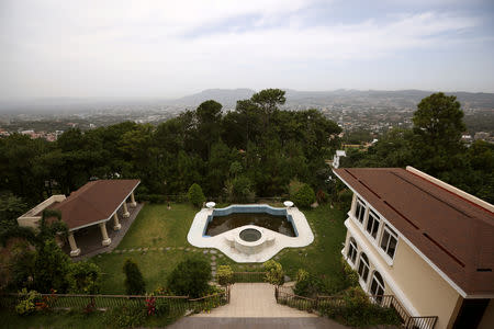 FILE PHOTO: A panoramic view of a backyard of a house of El Salvador's former President Elias Antonio Saca, seized by the Attorney General's Office, in San Salvador, El Salvador, August 10, 2018. REUTERS/Jose Cabezas/File Photo