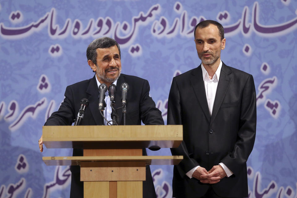 Former Iranian President Mahmoud Ahmadinejad, left, and his close ally Hamid Baghaei attend a press conference after registering his candidacy for the upcoming presidential election, at the election headquarters of the interior ministry, in Tehran, Iran, Wednesday, April 12, 2017. Ahmadinejad on Wednesday unexpectedly filed to run in the country's May presidential election, contradicting a recommendation from the supreme leader to stay out of the race. (AP Photo/Ebrahim Noroozi)