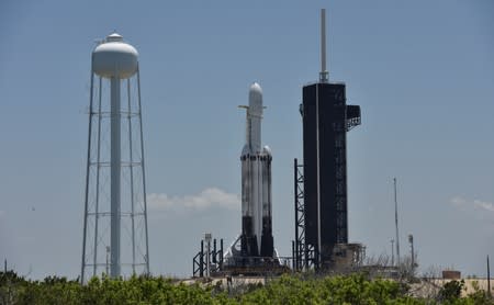 A SpaceX Falcon Heavy rocket, carrying the U.S. Air Force's Space Test Program-2 mission, is shown during launch preparation at the Kennedy Space Center in Cape Canaveral