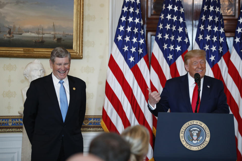 President Donald Trump speaks during an event to present the Presidential Medal of Freedom to Jim Ryun, left, in the Blue Room of the White House, Friday, July 24, 2020, in Washington. (AP Photo/Alex Brandon)