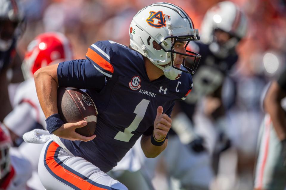 Auburn Tigers quarterback Payton Thorne (1) breaks free for a long run as Auburn Tigers take on Georgia Bulldogs at Jordan-Hare Stadium in Auburn, Ala., on Saturday, Sept. 30, 2023.