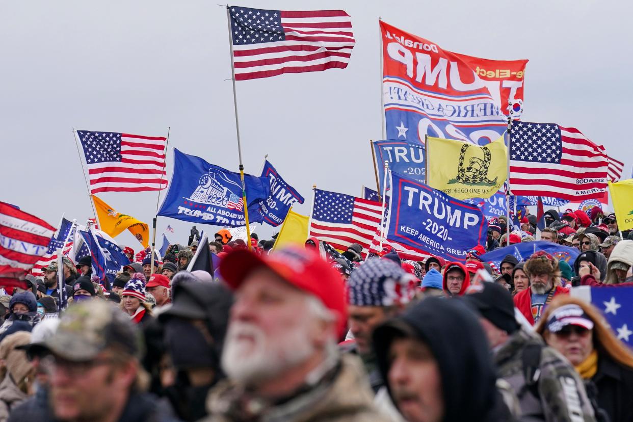 Donald Trump supporters participate in a rally in Washington, Jan. 6, 2021, that preceded an attack on the U.S. Capitol. (Credit: John Minchillo/Associated Press/File)