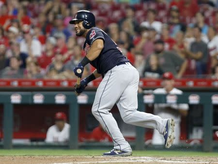 Aug 15, 2018; Cincinnati, OH, USA; Cleveland Indians center fielder Melky Cabrera (53) watches after hitting a two-run home run against the Cincinnati Reds during the sixth inning at Great American Ball Park. Mandatory Credit: David Kohl-USA TODAY Sports