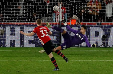 Soccer Football - FA Cup Third Round Replay - Southampton v Derby County - St Mary's Stadium, Southampton, Britain - January 16, 2019 Southampton's Matt Targett scores a penalty during a penalty shootout REUTERS/David Klein