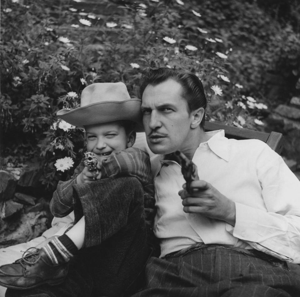 <p>The horror actor, star of <em>House of Wax</em> and <em>House on Haunted Hill</em>, relaxes with his son in the yard of his Beverly Hills home, circa 1946.</p>